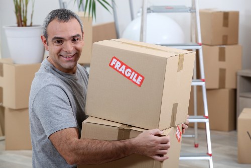 Removal van team beginning a safe move with planning and protective equipment