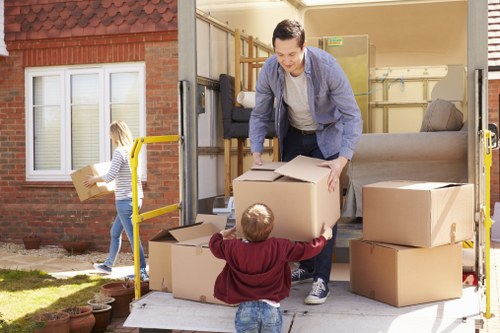 Packing materials and wrapped household items prepared for a Westminster move