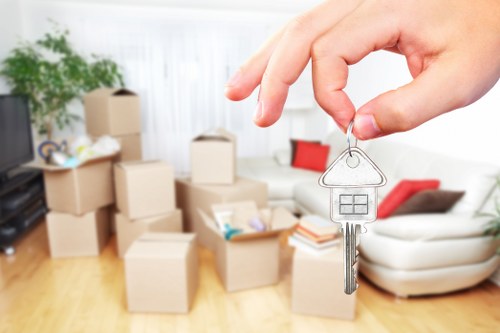 Removal van team managing furniture and household items