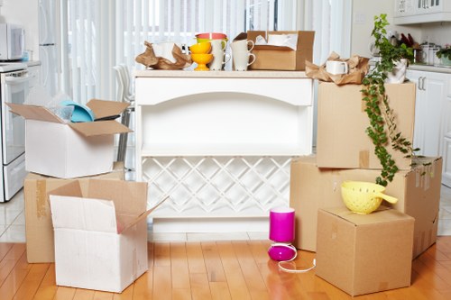 Local movers transporting household items from a Westminster flat