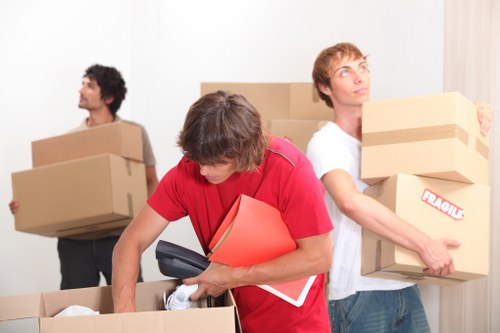 Household furniture and boxes being moved in Westminster