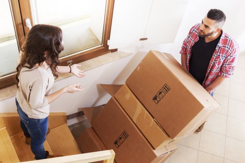 Van loading furniture from a central London property